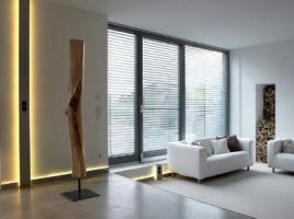 Living room with large windows and a sofa