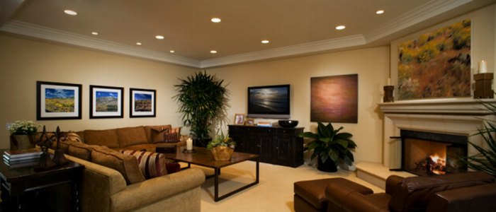 Living room with a screen and evening lighting
