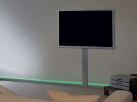 Television on a floor stand in a room